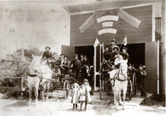 Picture of fire department using horse drawn equipment.