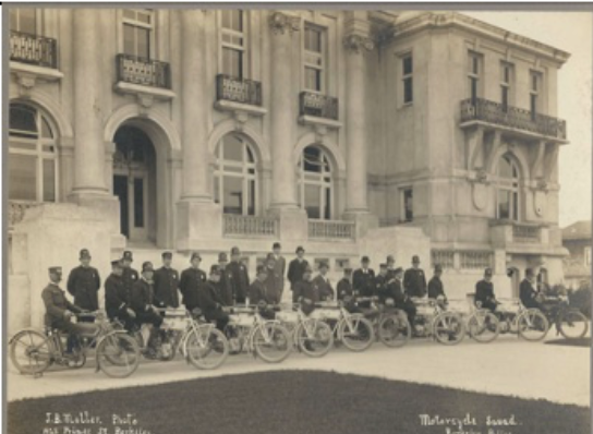 Old picture of police offices and their bicycles